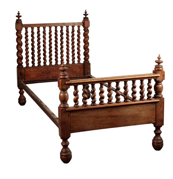 A 17TH CENTURY STYLE WALNUT BED