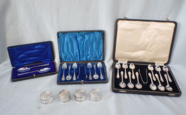 A CASED SET OF SILVER-PLATED TEASPOONS, SUGAR TONGS