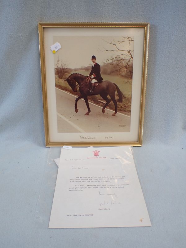 A  PHOTOGRAPH OF PRINCE CHARLES, SIGNED TO THE MOUNT