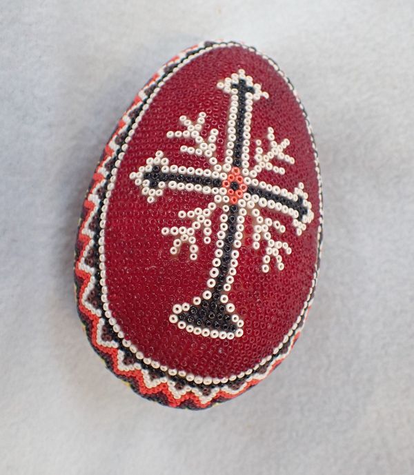 A PRISONER OF WAR BEADWORK DECORATED EGG