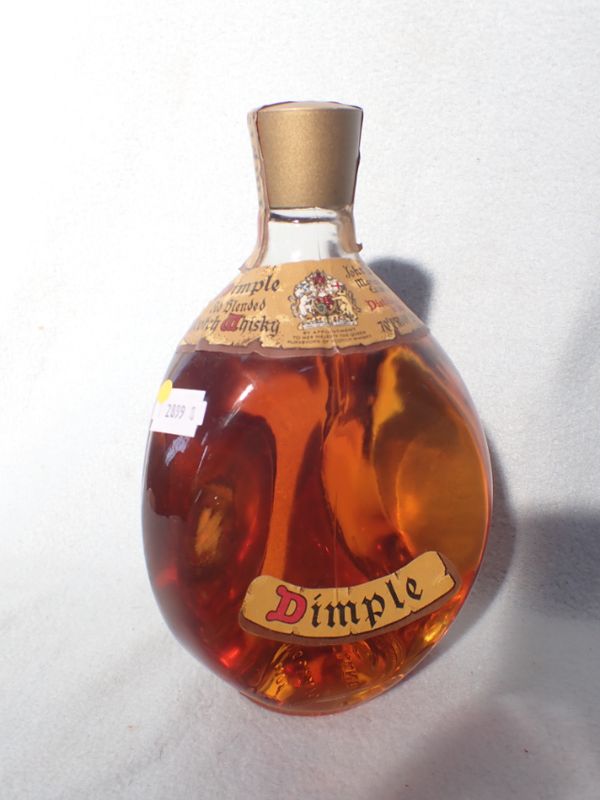 A BOTTLE OF JOHN HAIG DIMPLE WHISKY