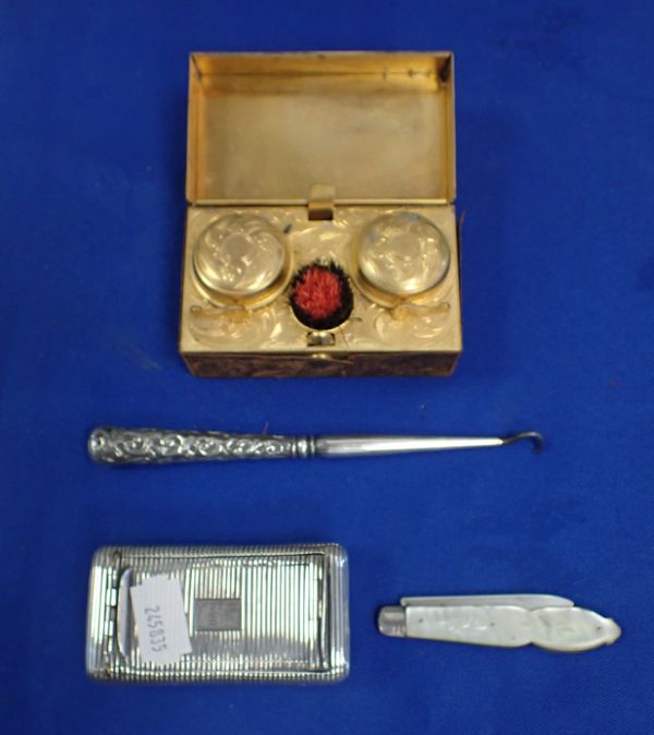 A SILVER TABACCO CASE