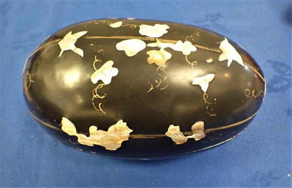 AN ASIAN BLACK LACQUER AND MOTHER OF PEARL CONTAINER