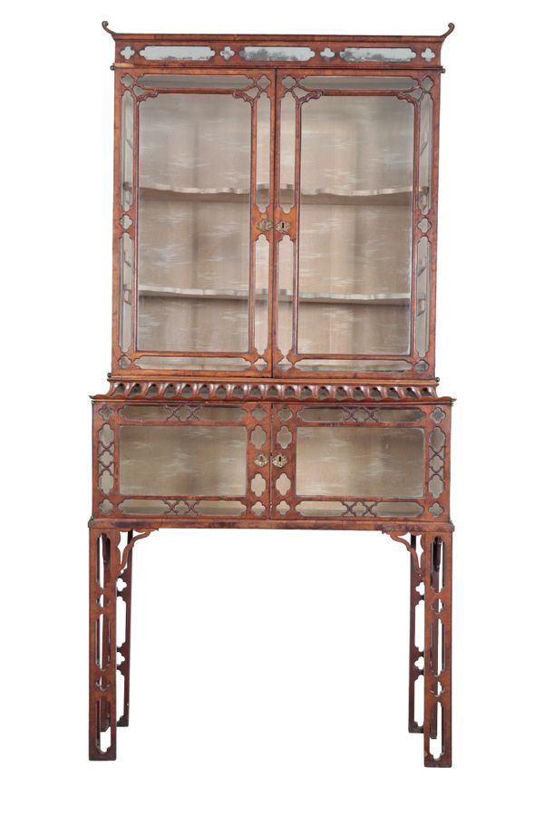 A MID-VICTORIAN WALNUT DISPLAY CABINET-ON-STAND