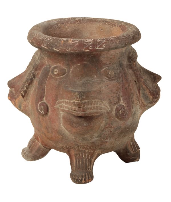 A TRIBAL POTTERY VESSEL