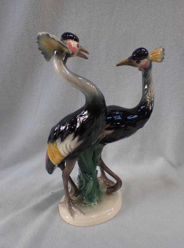 A WEST GERMAN CERAMIC MODEL OF TWO EXOTIC BIRDS