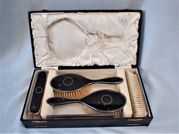 A BOXED SILVER AND TORTOISE SHELL DRESSING SET