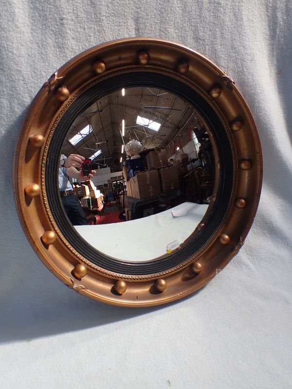 A REGENCY DESIGN CONVEX MIRROR