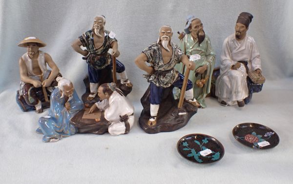 A COLLECTION OF ORIENTAL FIGURES