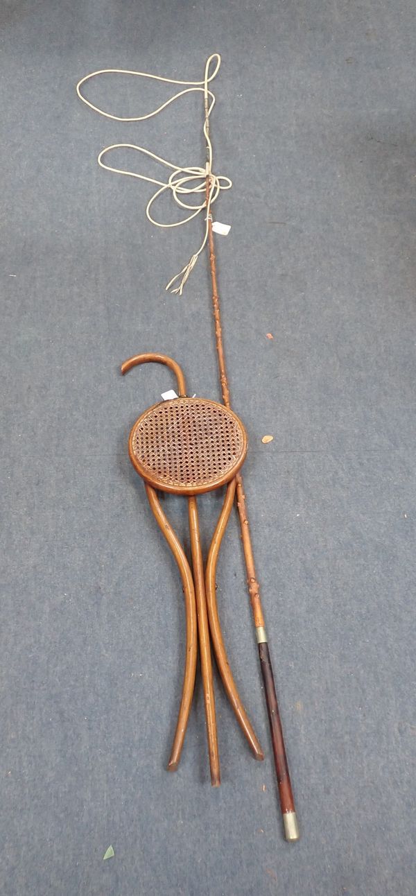 A COACHING WHIP, WITH LEATHER GRIP