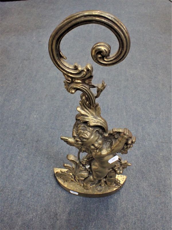 A BRASS CHERUB  DOOR STOP