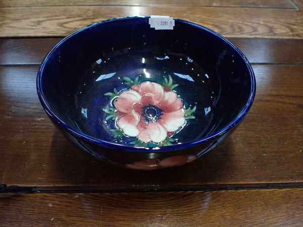 A MOORCROFT ANEMONE PATTERN ON BLUE GROUND BOWL