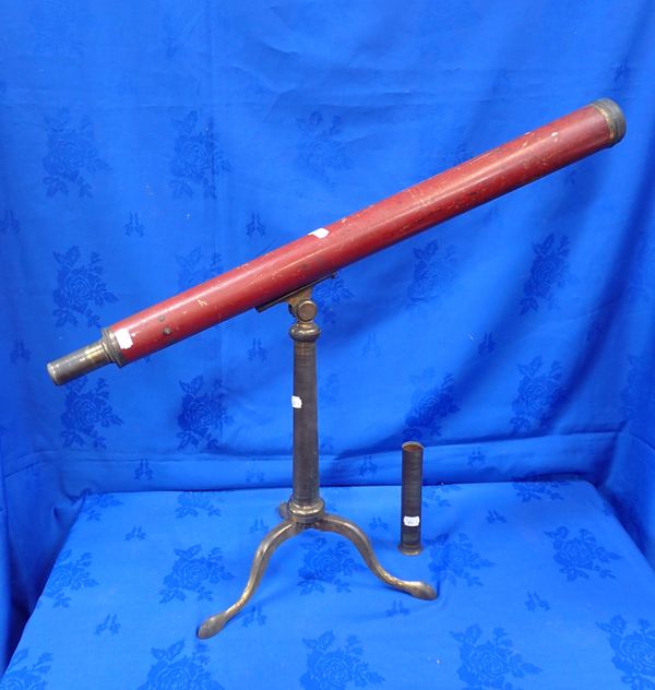 A TELESCOPE WITH BRASS STAND