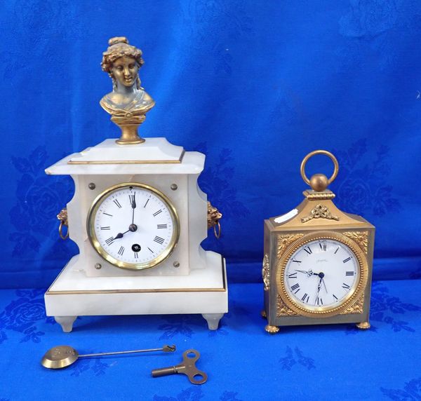 A VICTORIAN ALABASTER AND BRASS CLOCK