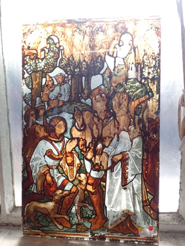 A MEDIEVAL STYLE STAINED GLASS PANEL