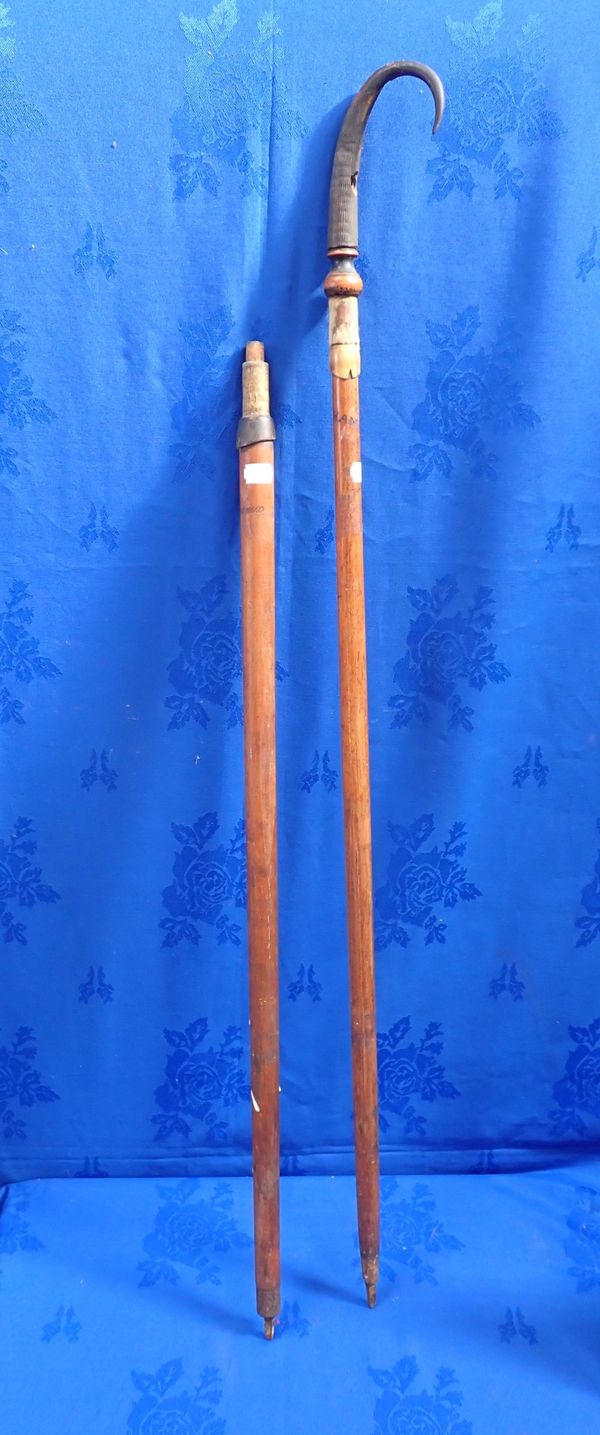 A PAIR OF VINTAGE ALPINE WALKING STICKS