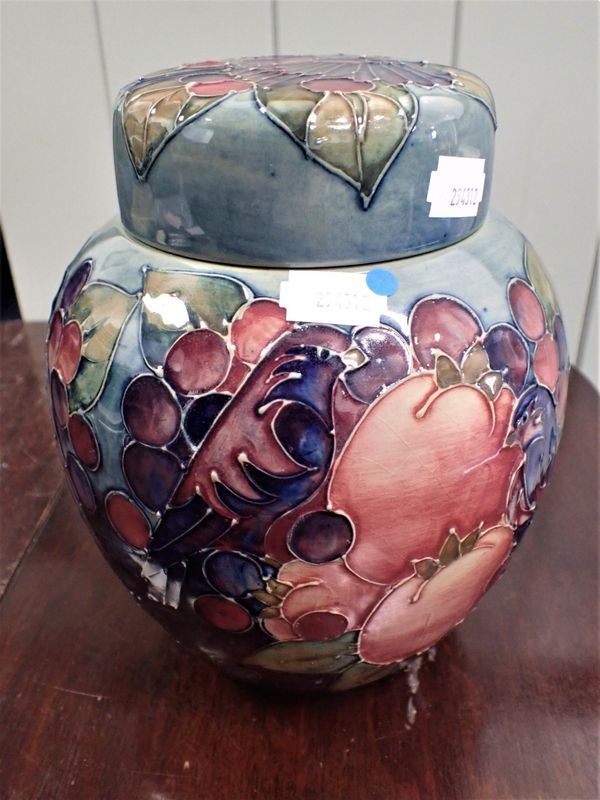 A MOORCROFT POMEGRANATE JAR AND COVER