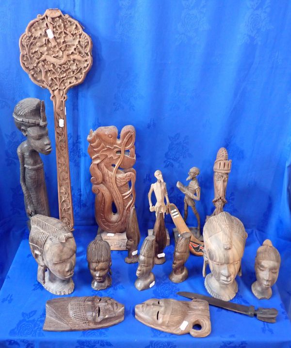 A COLLECTION OF AFRICAN AND OTHER CARVED WOODEN HEADS AND SCULPTURES