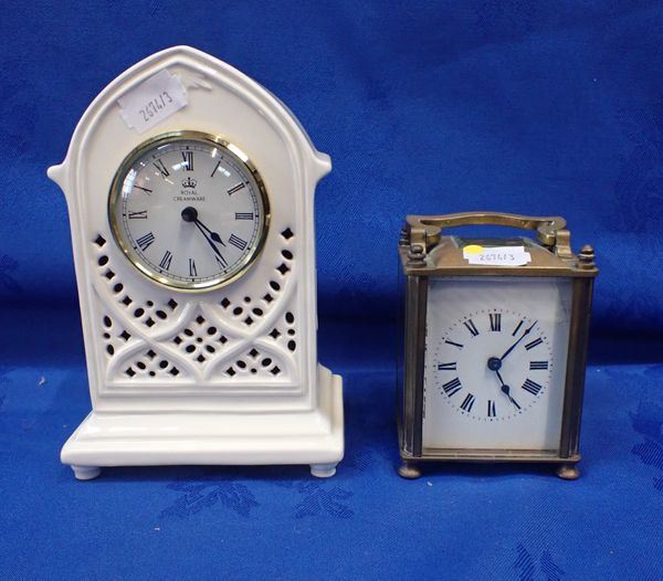 A CARRIAGE CLOCK AND A CERAMIC CASED MANTEL CLOCK