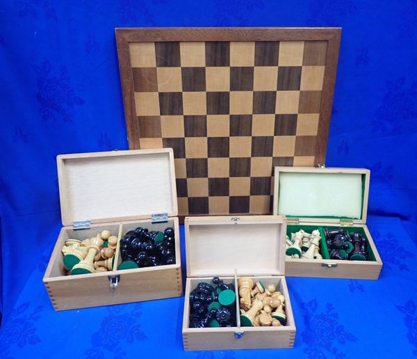 THREE BOXED CHESS SETS AND A BOARD