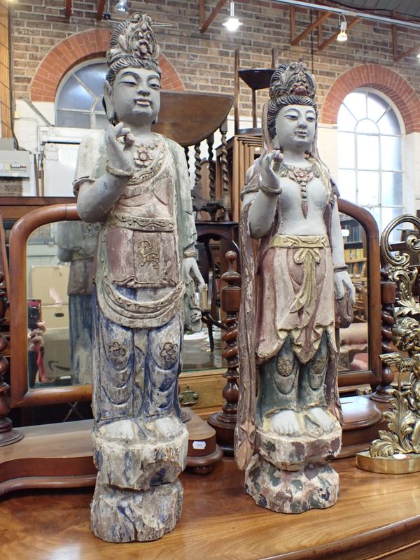 TWO WOODEN PAINTED ASIAN STATUES