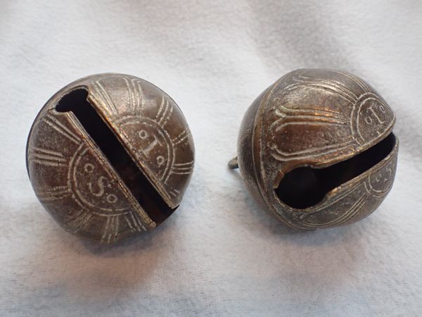 TWO CROTAL BELLS, MARKED 'I S'