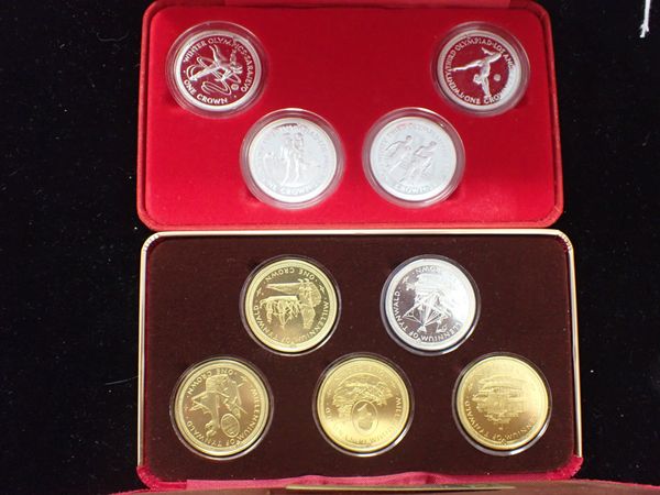 POBJOY MINT LTD: A SET OF FOUR SILVER ISLE OF MAN 1984 OLYMPIC CROWNS,