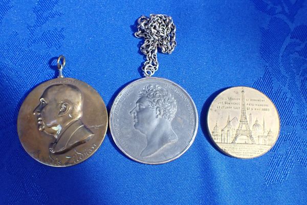 AN SOUVENIR  EIFFEL TOWER ASCENT MEDAL FROM THE PARIS EXPOSITION OF 1889