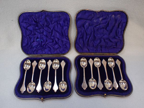 TWO MATCHING CASED SETS OF SILVER TEASPOONS