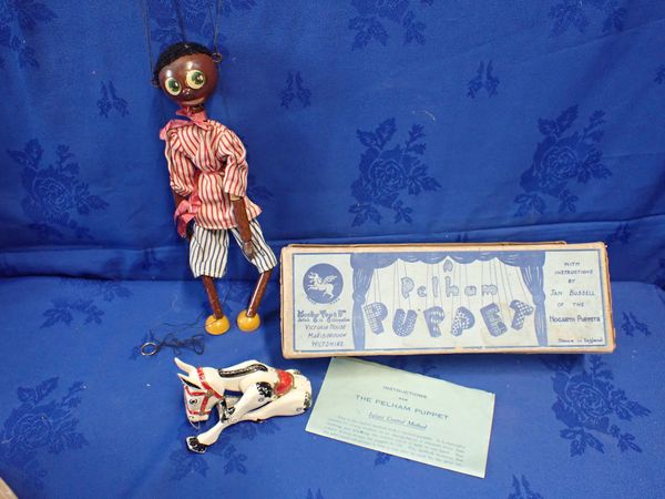 A PELHAM PUPPET BLACK CHARACTER, IN BLUE LABELLED BOX