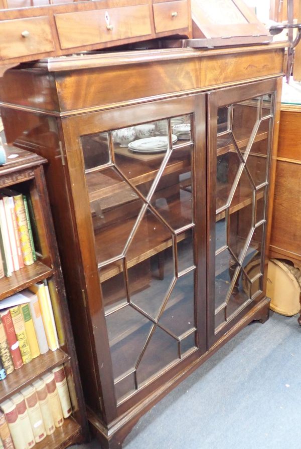 A MAHOGANY DISPLAY CABINET