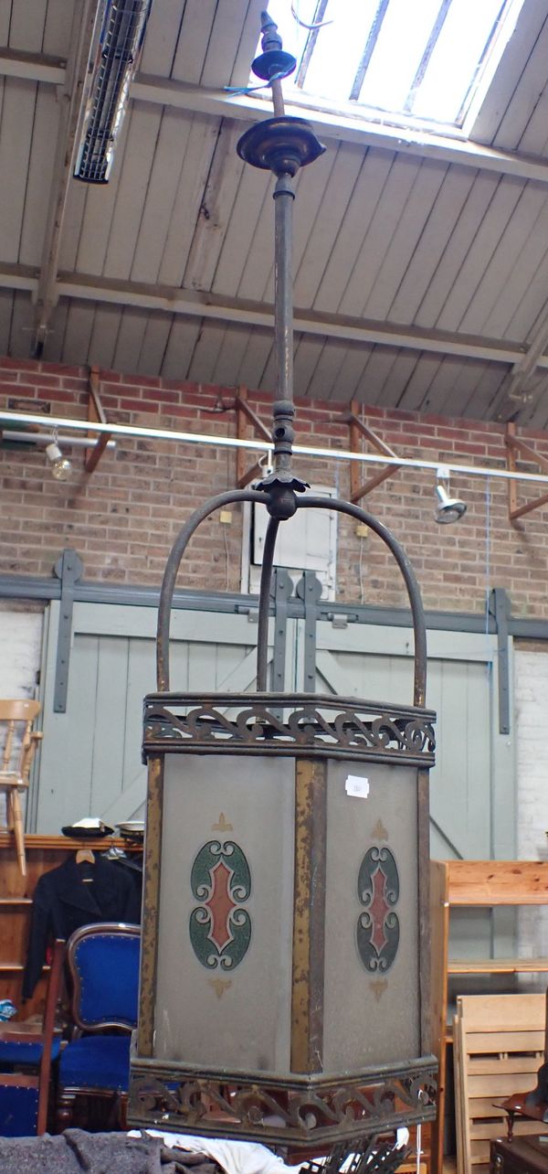 AN EDWARDIAN BRASS FRAMED HALL LANTERN