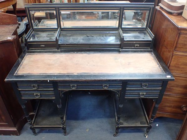 AN EBONISED AND GILT 'AESTHETIC' STYLE DESK