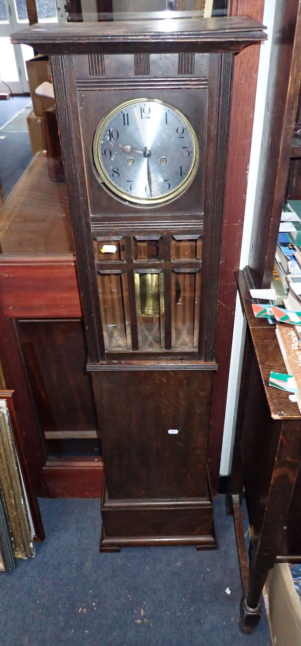 A 1920S OAK-CASED WALL CLOCK