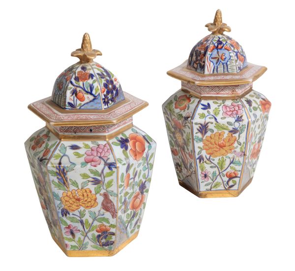 A PAIR OF 19TH CENTURY STONEWARE VASES AND COVERS