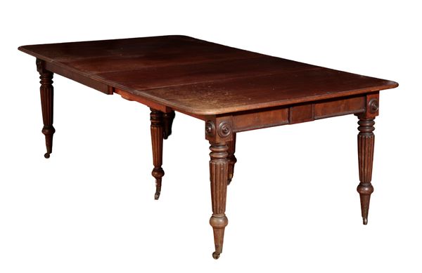 A GEORGE IV MAHOGANY EXTENDING DINING TABLE