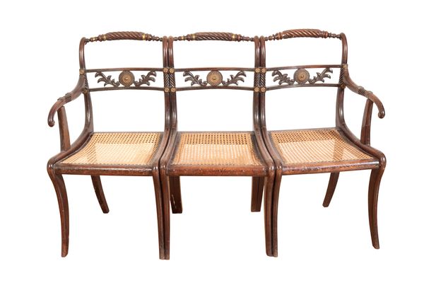 A REGENCY SIMULATED ROSEWOOD BENCH ADAPTED FROM THREE DINING CHAIRS