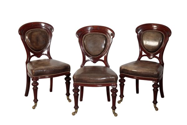 A SET OF SIX 19TH CENTURY MAHOGANY AND LEATHER UPHOLSTERED DINING CHAIRS