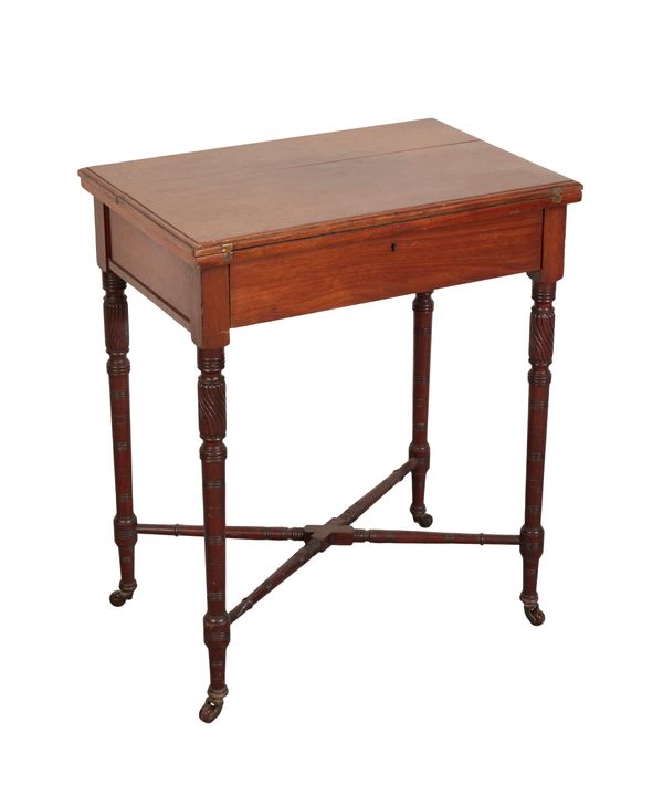 A 19TH CENTURY MAHOGANY WRITING TABLE BY JAMES SHOOLBRED & CO.