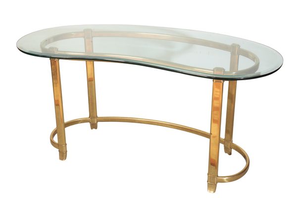 A GLASS KIDNEY SHAPED WRITING DESK