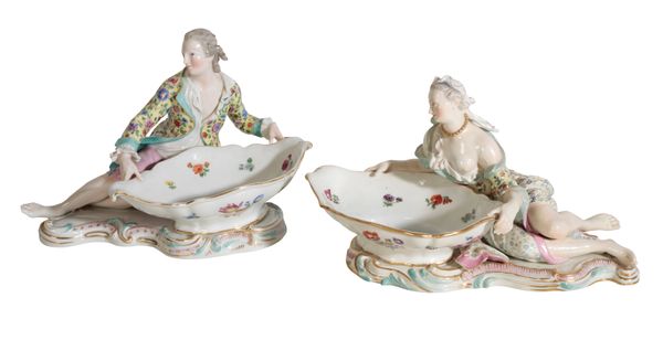 A PAIR OF MEISSEN RECUMBENT FIGURES