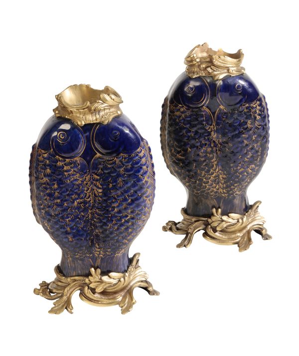 A PAIR OF PORCELAIN AND ORMOLU MOUNTED 'FISH' VASES