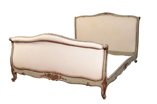 A LOUIS XV STYLE POLYCHROME AND PARCEL-GILT BED