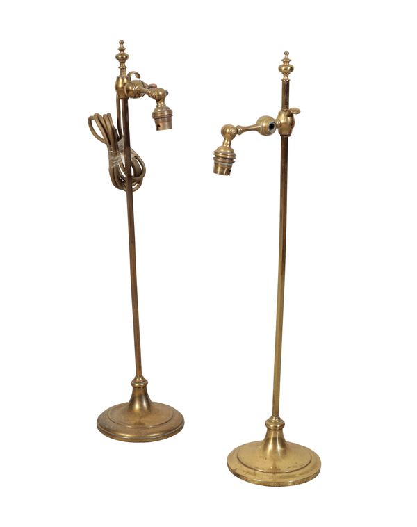 A PAIR OF ADJUSTABLE BRASS TABLE LAMPS BY FARADAY & SONS