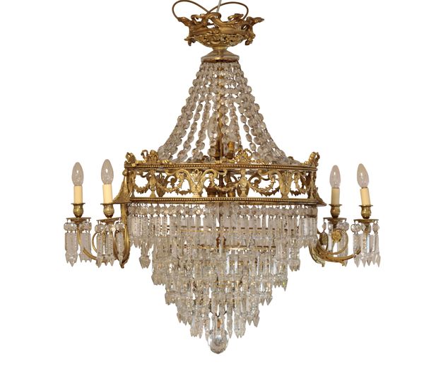 A GILT METAL AND CUT GLASS CHANDELIER