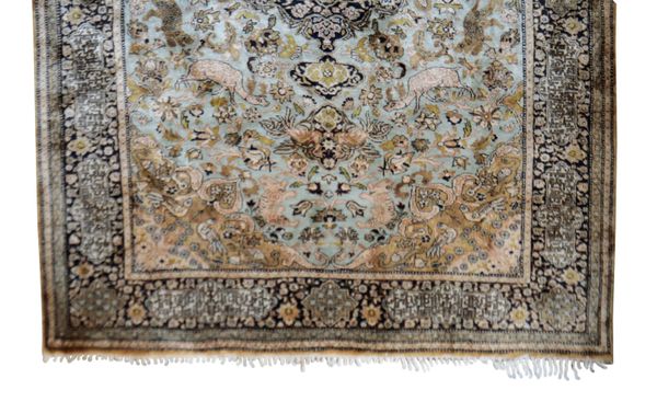 A QUM SILK RUG