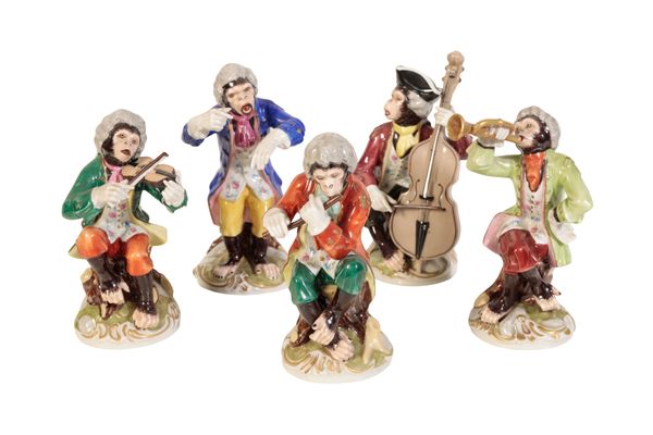 A SET OF FIVE MEISSEN STYLE MONKEY BAND FIGURES