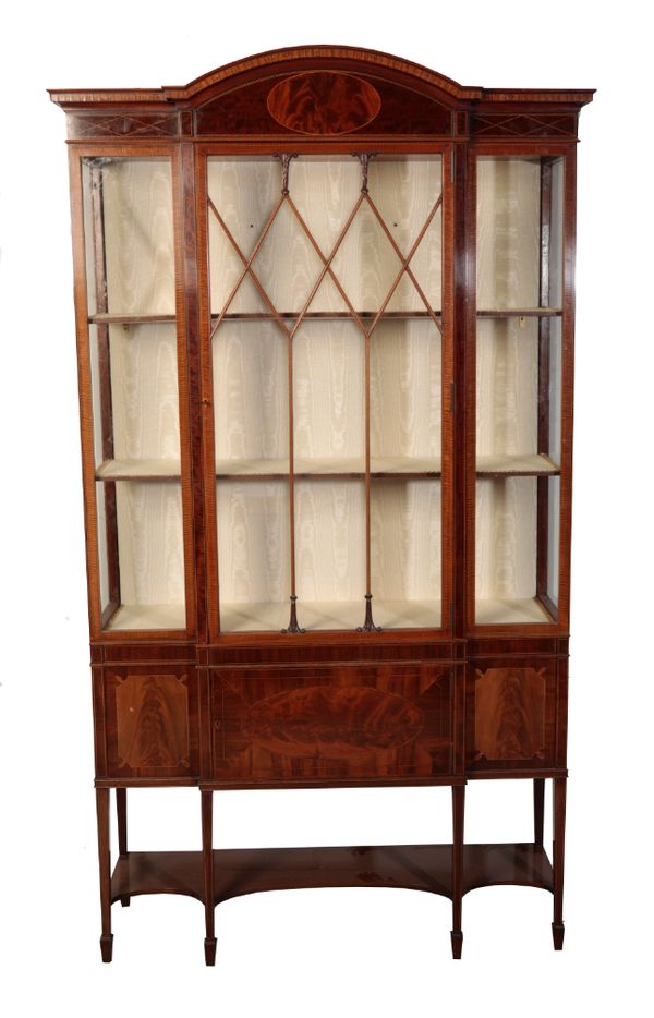 AN EDWARDIAN MAHOGANY BREAKFRONT DISPLAY CABINET