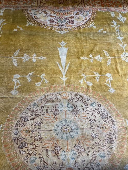 A LARGE COUNTRY HOUSE CARPET