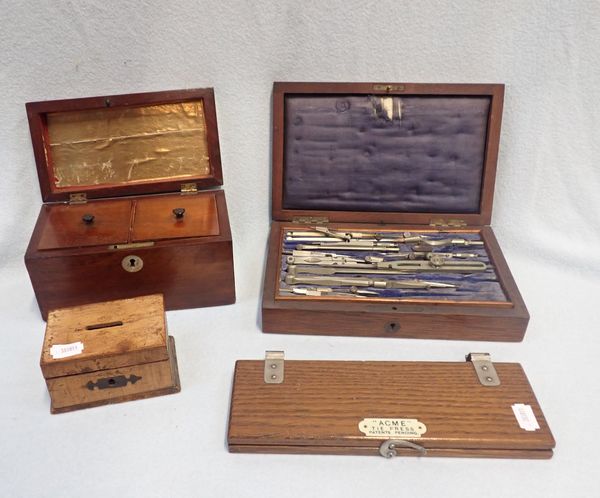 A CASED SET OF DRAWING INSTRUMENTS